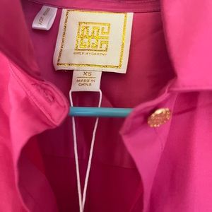 Emily McCarthy Hot pink shirt